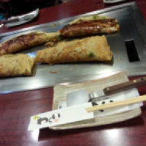 Okonomiyaki is like a Japanese omelette (omelette pancake?). Very tasty!